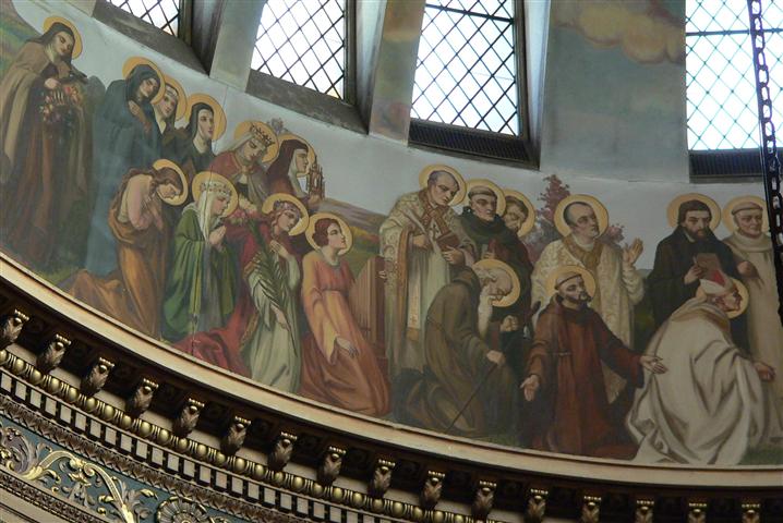 St. Bernard of Clairbeaux (1090-1153) and St. Rose of Lima (1568-1617), whose feastdays we celebrate this week, are depicted in the dome of our church in a painting by Buffalo-born artist Joseph Mazur. St. Rose appears in a group of ten figures identified as “Virgins and Widows”; she is the second kneeling figure from the left, wearing a green cloak and floral crown. St. Bernard appears in a grouping of “Monks, Hermits, and Religious”; his figure is at the far right in this photo, robed in white. (Rev. Walter Kern’s "Guidebook to Blessed Trinity R. C. Church," p. 38. Photo credit: Gary Kelley.