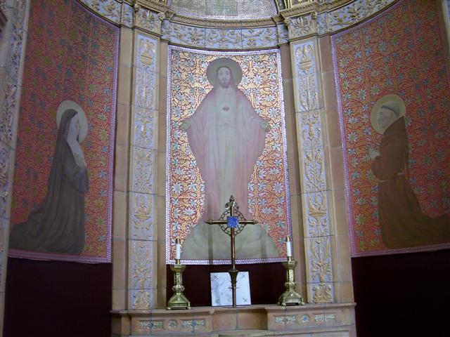 Blessed Trinity's Sacred Heart altar features this mural representing Christ as "a totally loving Person. The exposed Heart is merely the symbol of this insight and an invitation to return love for love."(Rev. Walter Kern’s Guidebook to Blessed Trinity Roman Catholic Church, page 28).