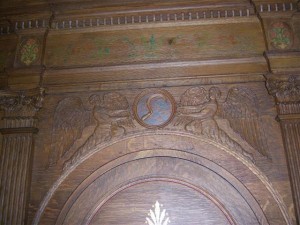 "The Trades" are highlighted in six small carvings on the ushers' office in the rear of our church. Agricultural workers are represented by the farmer's sickle.
