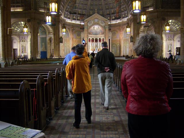 Just a few of the tourists who visited during Doors Open Niagara. The "wow" effect upon entering the nave always starts the cameras clicking. Photo credit: Margaret Dick.