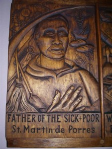 St. Martin de Porres November 3 Woodcarving of St. Martin de Porres in the church's left transept. A gift of the Southtowns Woodcarvers.