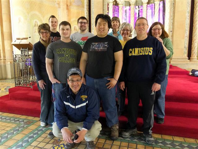 Even though their students are on a semester break, our friend Joe Van Volkenberg from Canisius College Campus Ministry still turned out a team of administration and student volunteers to help parishioners clean the church for Mass Mob IX. Joe Van Volkenberg (kneeling) is joined by his team of Canisius College volunteers in the Sanctuary of Blessed Trinity Church; left to right: Kathleen Delaney, Jonathan Christen, Jake Iannuzzelli, Mike Moeller, Joe ("AJ") Kwiatkowski, Ruth Coleman, Patty Grasso, Patrick Burke, and Dr. Terri Mangione.