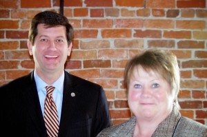 Paula Hunt, pictured here with County Executive Mark Poloncarz when she received her "Unsung Hero Award" at the Homeless Alliance Luncheon in February.